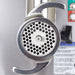 Pro-Cut KG-12-SS Meat Grinder Electric #12 Hub — close-up of the grinder plate and head