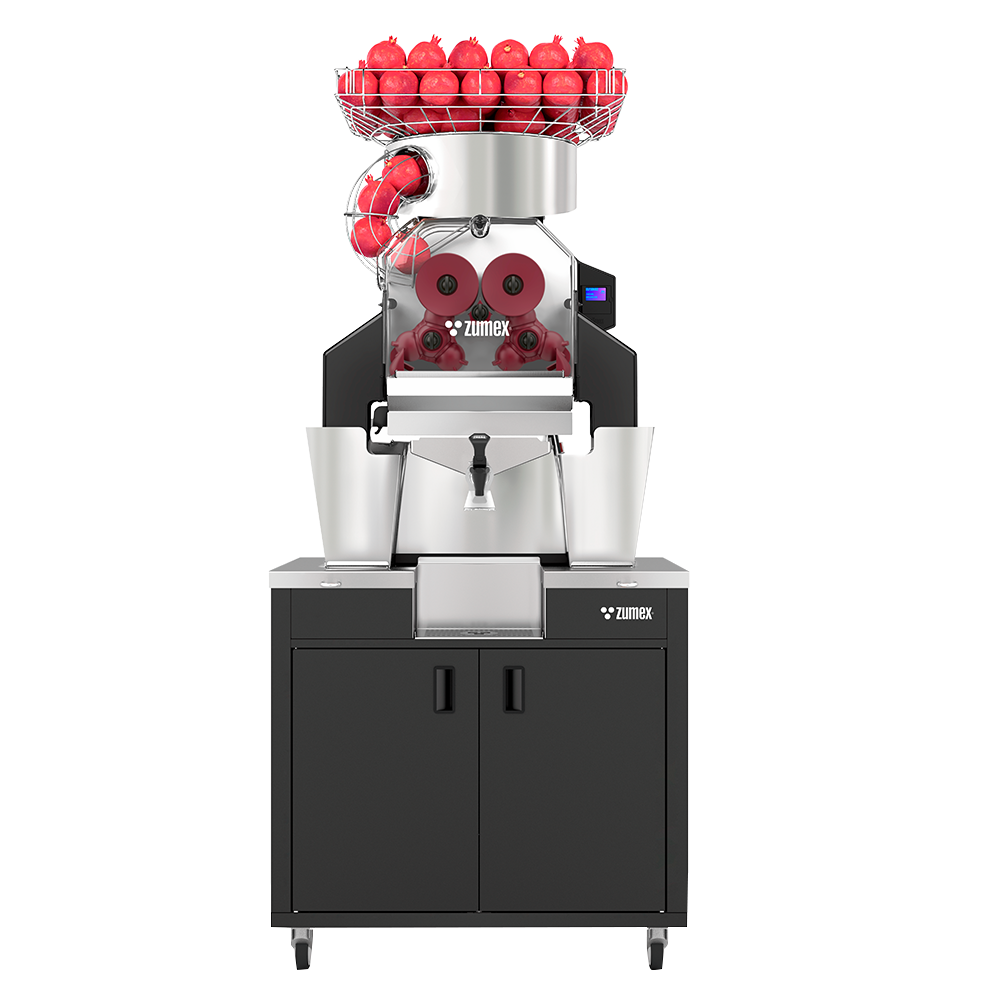 Zumex Speed Pomegranates All-in-One Wide pomegranate juicer on black podium