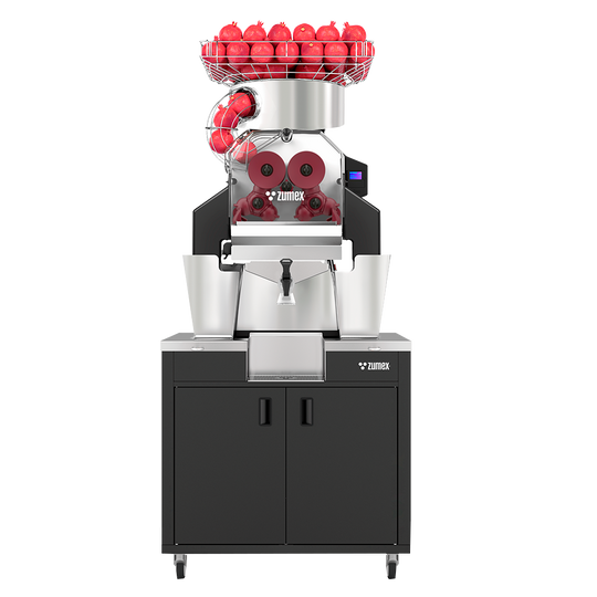Zumex Speed Pomegranates All-in-One Wide pomegranate juicer on black podium