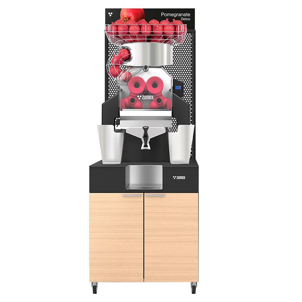 Zumex Speed Pomegranates Juice Corner Wide pomegranate juicer with oiled oak furniture