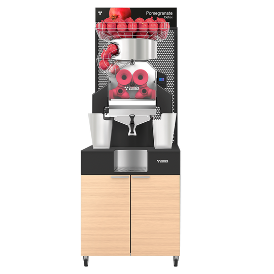 Zumex Speed Pomegranates Juice Corner Wide pomegranate juicer with oiled oak furniture