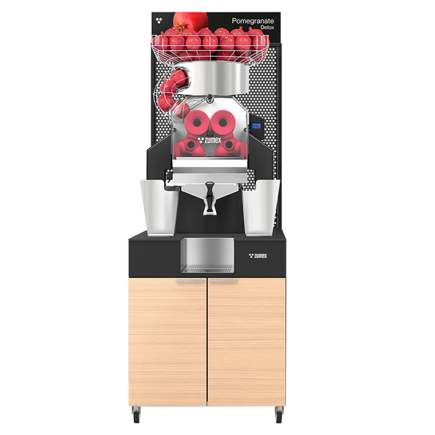 Zumex Speed Pomegranates Juice Corner Wide pomegranate juicer with oiled oak furniture
