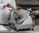 Omcan MS-CN-0195 8 inch belt driven meat slicer with built in sharpener