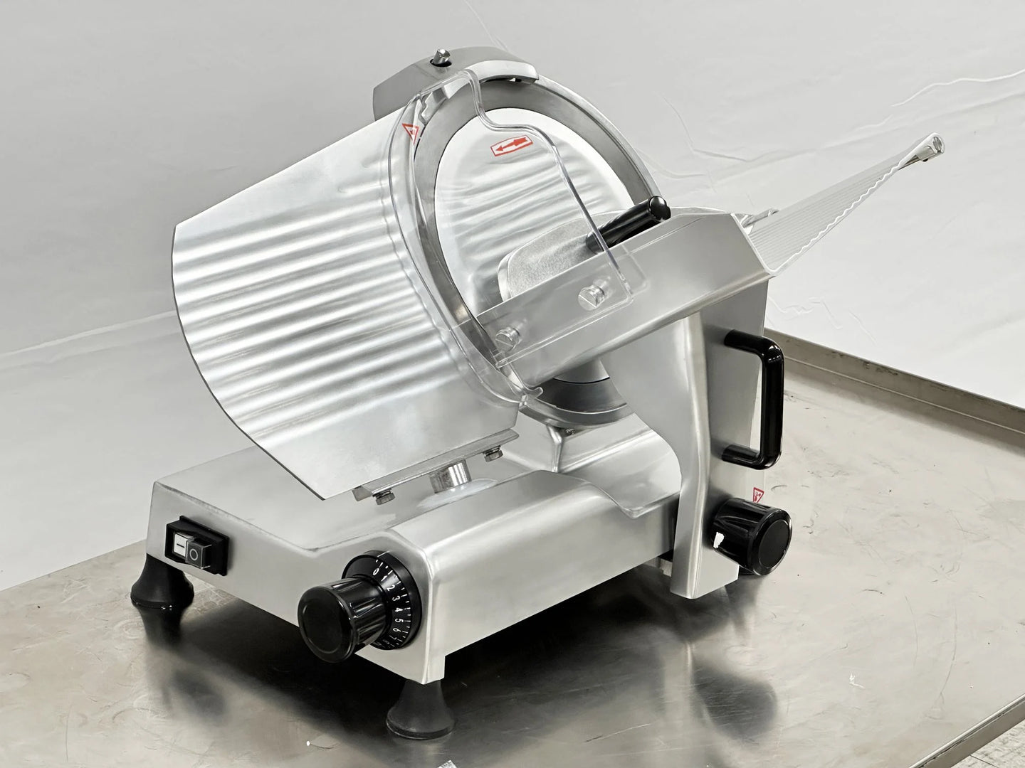 BakeMax BMMSM12 12 Inch Manual Meat Slicer Gravity Feed Anodized Aluminum — BakeMax manufacturer photo, front left view