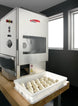 BakeMax BMDD003 28 Inch Dough Divider Automatic 44 Liter Capacity and Scales — BakeMax manufacturer photo, front right view of divider rounder