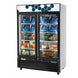 Migali Industries C-49FM-HC 54 Inch Two-Section Freezer Merchandiser - front view of the two glass door upright merchandiser stocked with frozen product and lit interior