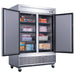 Dukers D55F two door reach-in freezer in a commercial kitchen