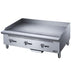 Dukers DCGMA36 gas griddle angled view showing deep cooking surface and splash guard