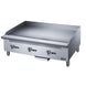 Dukers DCGMA36 gas griddle angled view showing deep cooking surface and splash guard