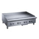 Dukers DCGMA48 48 inch manual gas griddle with four burner controls and 1 inch polished steel plate