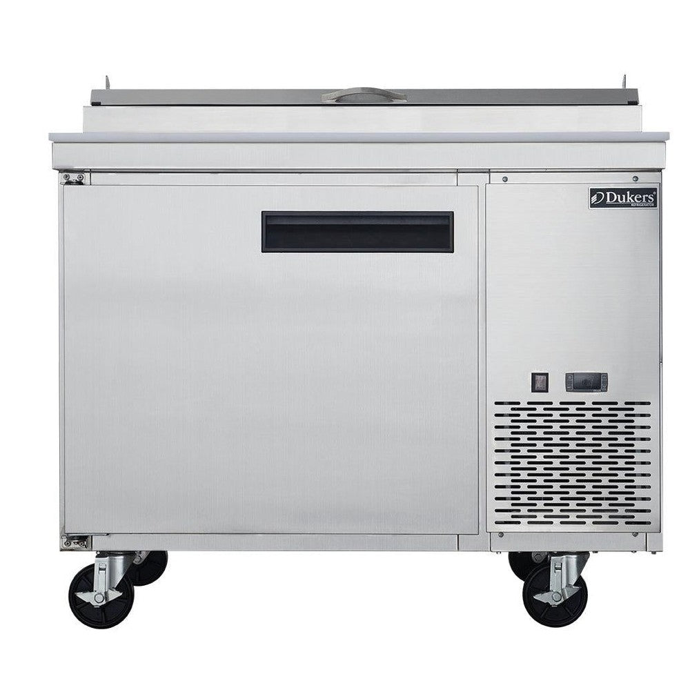Dukers DPP44 pizza prep table with the topping rail cover raised showing six one-third size pans