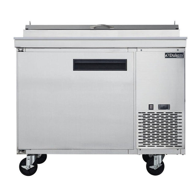 Dukers DPP44 pizza prep table with the topping rail cover raised showing six one-third size pans