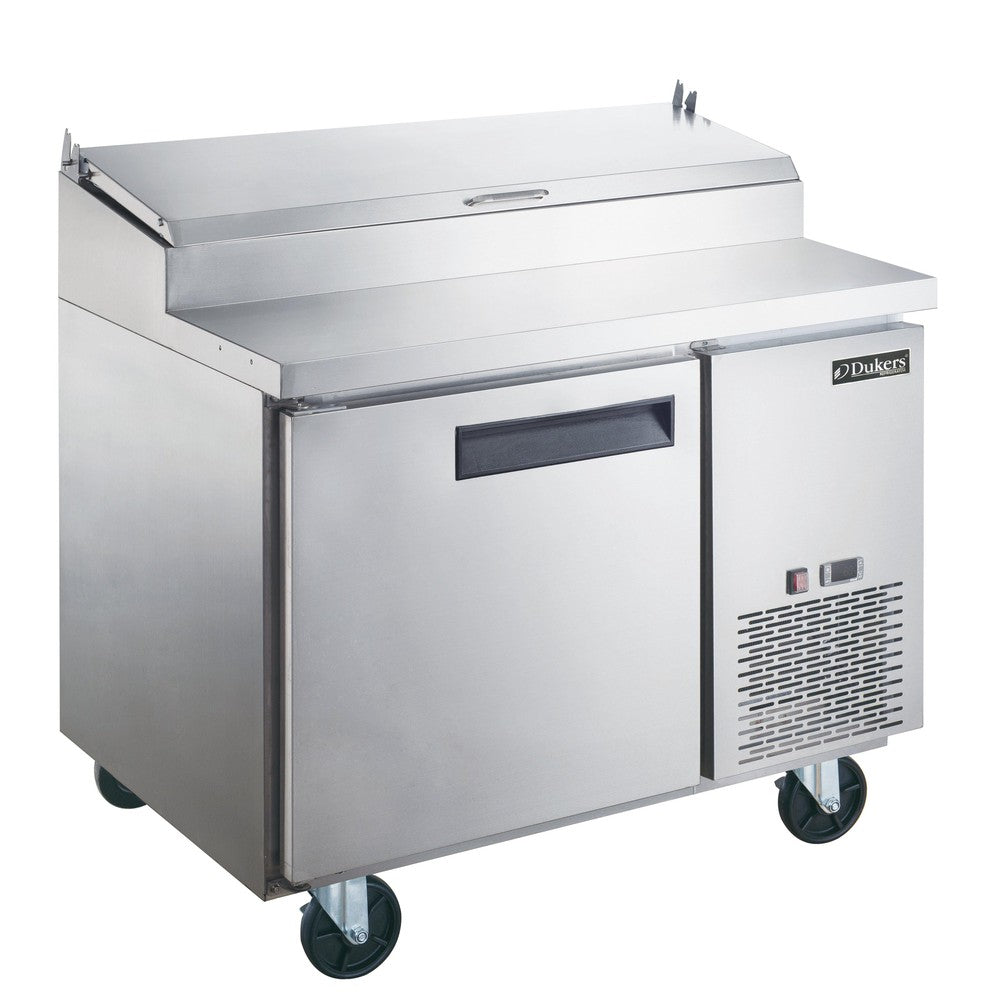 Dukers DPP44 44 inch stainless steel pizza prep table with single solid door and hinged topping rail cover