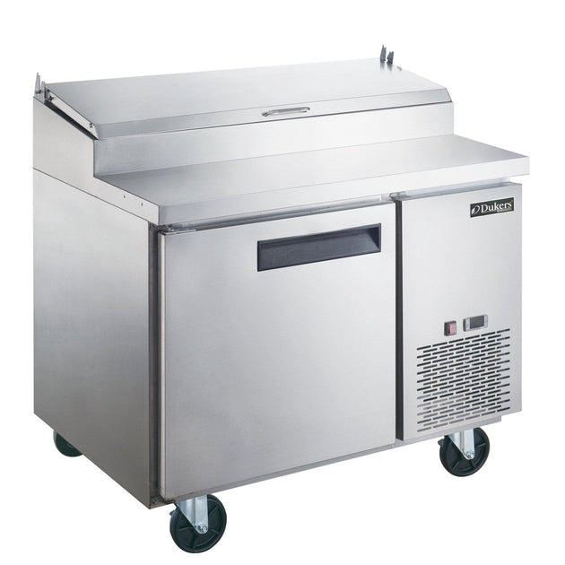 Dukers DPP44 44 inch stainless steel pizza prep table with single solid door and hinged topping rail cover