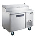 Dukers DPP44 44 inch stainless steel pizza prep table with single solid door and hinged topping rail cover