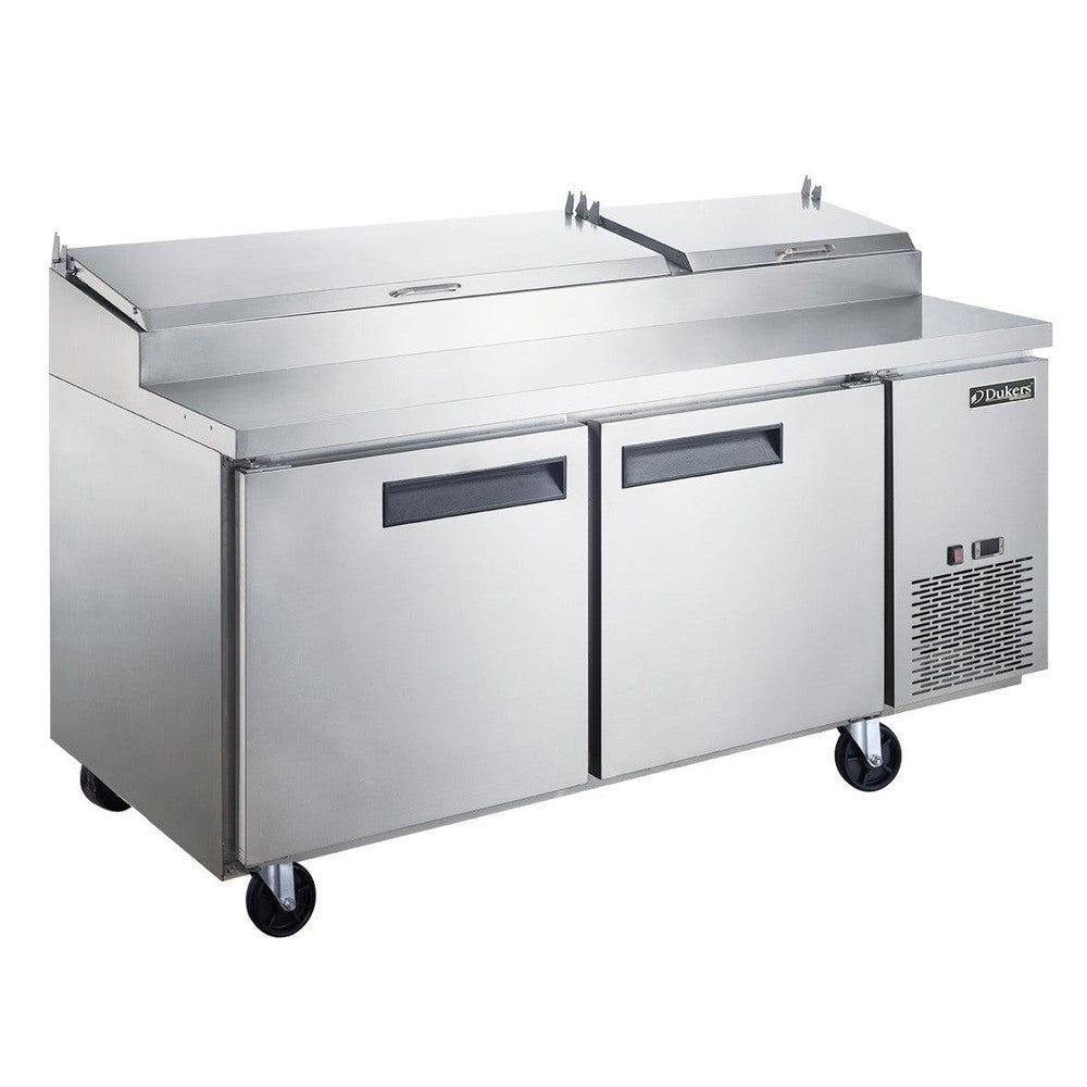 Dukers DPP70 70 inch stainless steel two door pizza prep table with hinged topping rail cover and casters