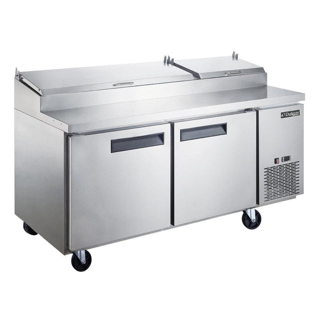 Dukers DPP70 70 inch stainless steel two door pizza prep table with hinged topping rail cover and casters