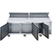 Dukers DPP90 pizza prep table with the topping rail cover open showing twelve one-third size pans