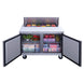 Dukers DSP48-12-S2 prep table in a commercial kitchen build line