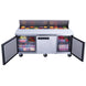 Dukers DSP72-18-S3 six foot prep table in a commercial kitchen