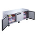 Dukers DUC72R three door undercounter refrigerator in a commercial kitchen