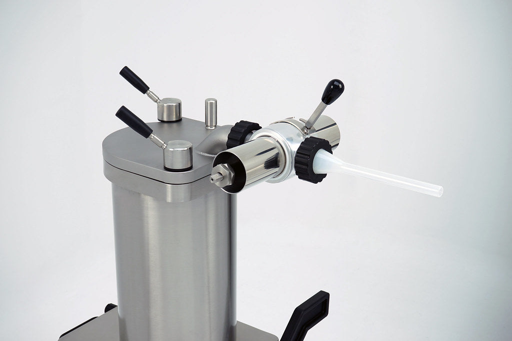 Omcan 46180 portion control head in use