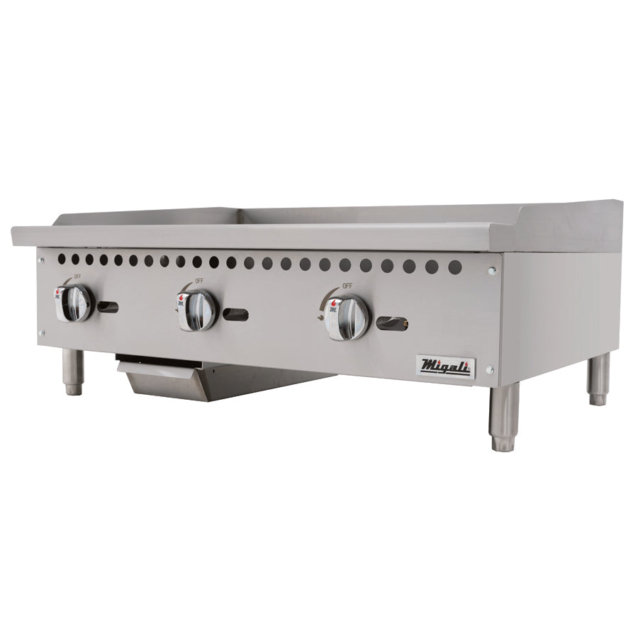 Migali Industries C-G36 36 Inch Gas Countertop Griddle - front three-quarter view showing the polished griddle plate, three control knobs and front grease trough